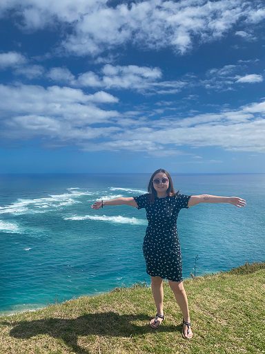 Ocean crashing against each other at Cape Reinga Lighthouse lookout, New Zealand